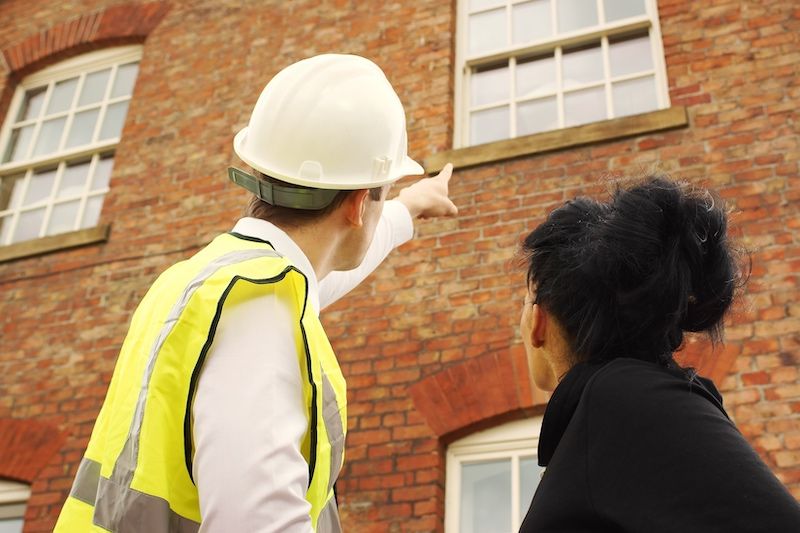 What does a surveyor do on a property visit?